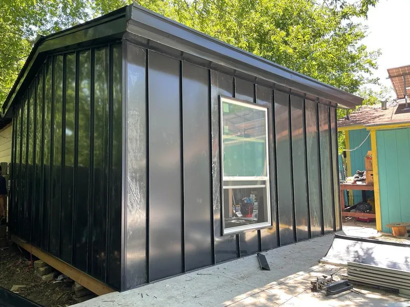 Black standing seam metal wall panels for Metal Roof Installation in South Valley