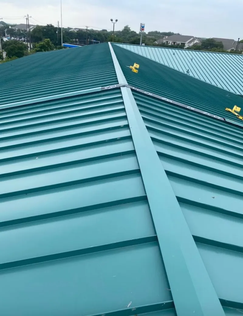 Green commercial metal roof ridge and valley for Metal Roof Repair in South Valley